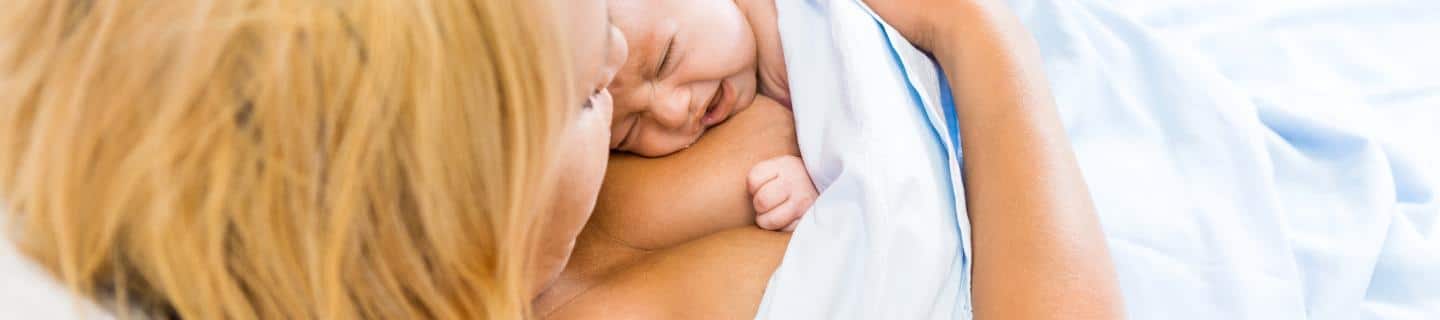Mother doing skin to skin with newborn baby