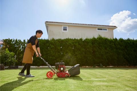 Man mowing his lawn